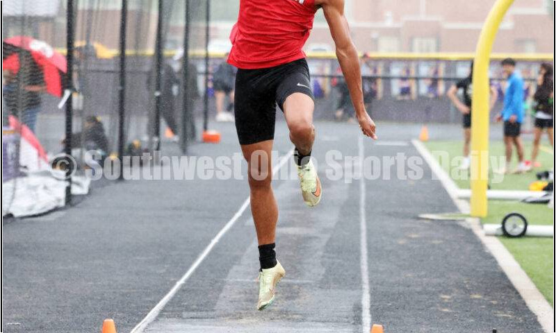 Franklin High School's Josh Carter competes in the boys long jump May 15 2024, during the Division I district track & field meet at Bellbrook. RICK CASSANO/STAFF