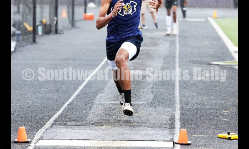 Monroe High School's Corey Williams-Carter competes in the boys long jump May 15 2024, during the Division I district track & field meet at Bellbrook. RICK CASSANO/STAFF
