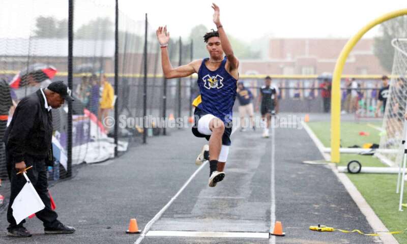 Monroe High School's Corey Williams-Carter competes in the boys long jump May 15 2024, during the Division I district track & field meet at Bellbrook. RICK CASSANO/STAFF