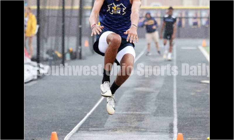 Monroe High School's Corey Williams-Carter competes in the boys long jump May 15 2024, during the Division I district track & field meet at Bellbrook. RICK CASSANO/STAFF