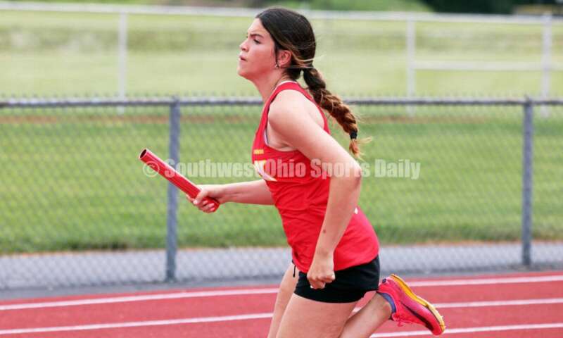 Fenwick High School's Sienna Johnson runs in the girls 800-meter relay May 25, 2024, during the Division II regional track & field meet at Piqua. RICK CASSANO/STAFF