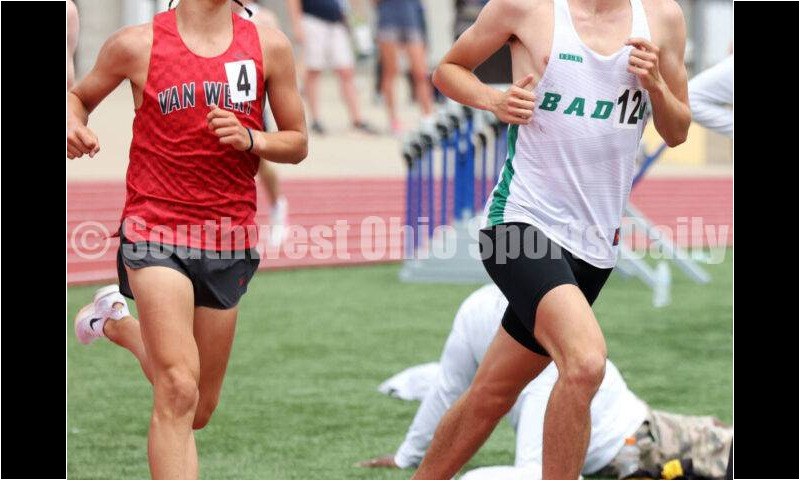 Badin High School's Nick Dunn runs in front of Van Wert's Owen Scott in the boys 3,200-meter race May 25, 2024, during the Division II regional track & field meet at Piqua. RICK CASSANO/STAFF