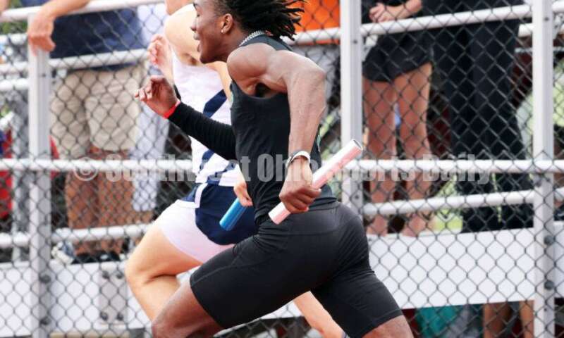 Badin High School's Kai Samples bolts for the finish line in the boys 400-meter relay May 25, 2024, during the Division II regional track & field meet at Piqua. RICK CASSANO/STAFF