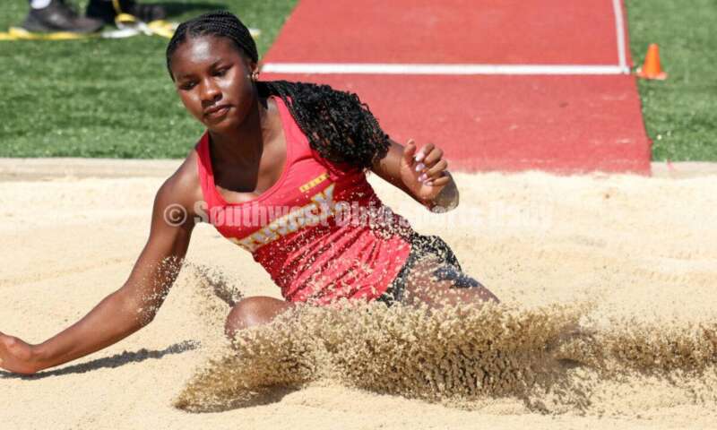 Fenwick High School's Brooklyn Vann lands in the girls long jump May 25, 2024, during the Division II regional track & field meet at Piqua. RICK CASSANO/STAFF