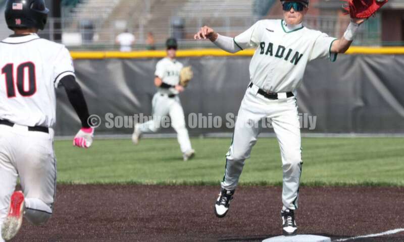 Badin High School's Austin Buckle can't handle this throw at first base May 31, 2024, during a Division II regional championship baseball game against Plain City Jonathan Alder at Mason. Badin won 2-0. RON ALVEY/CONTRIBUTOR