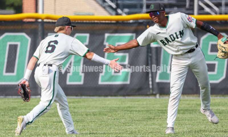 Badin High School left fielder Austin Vangen (6) is congratulated by center fielder Chandler Taylor after nailing a runner at the plate May 31, 2024, during a Division II regional championship baseball game against Plain City Jonathan Alder at Mason. Badin won 2-0. RON ALVEY/CONTRIBUTOR