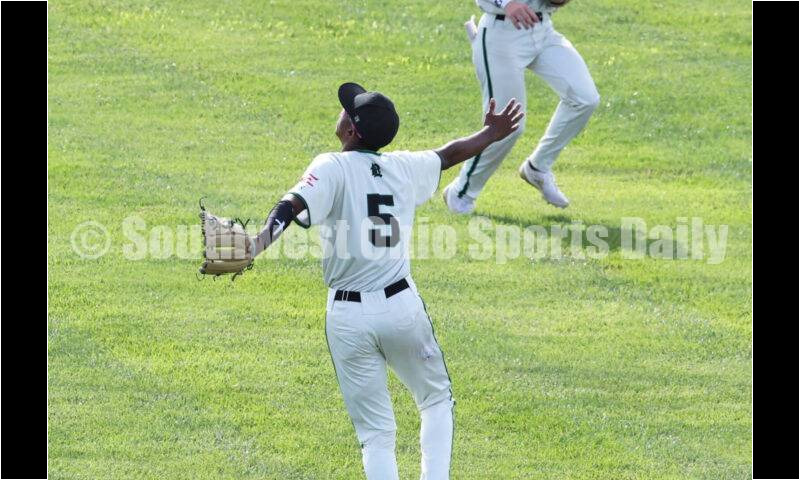 Badin High School center fielder Chandler Taylor calls off left fielder Austin Vangen on a fly ball May 31, 2024, during a Division II regional championship baseball game against Plain City Jonathan Alder at Mason. Badin won 2-0. RON ALVEY/CONTRIBUTOR