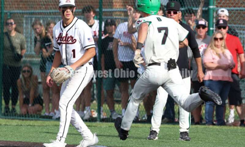 Badin High School's Cooper Ollis bunts his way onto first base May 31, 2024, during a Division II regional championship baseball game against Plain City Jonathan Alder at Mason. Badin won 2-0. RON ALVEY/CONTRIBUTOR