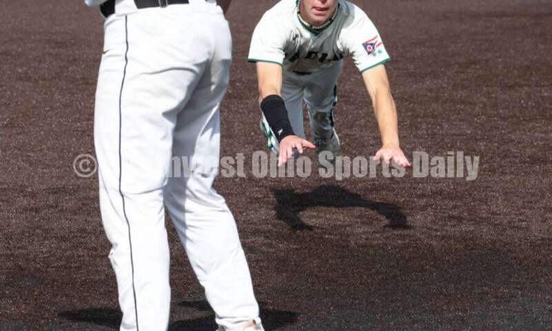 Badin High School's Chase Luebbe slides into third base May 31, 2024, during a Division II regional championship baseball game against Plain City Jonathan Alder at Mason. Badin won 2-0. RON ALVEY/CONTRIBUTOR