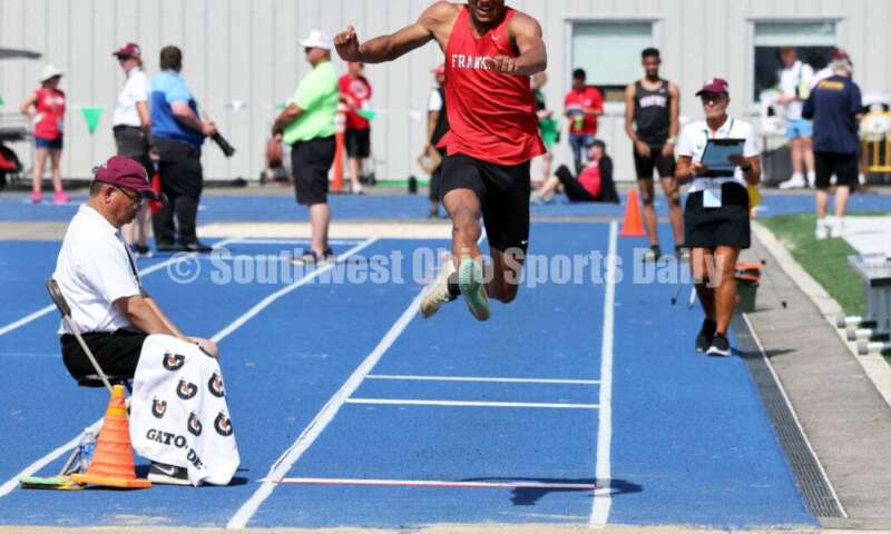 Franklin High School's Josh Carter flies through the air in the Division I boys long jump June 1, 2024, during the state track & field meet at Welcome Stadium in Dayton. Carter placed ninth. RICK CASSANO/STAFF