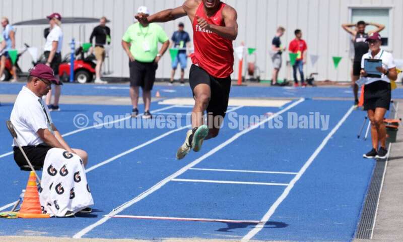 Franklin High School's Josh Carter takes off in the Division I boys long jump June 1, 2024, during the state track & field meet at Welcome Stadium in Dayton. Carter placed ninth. RICK CASSANO/STAFF