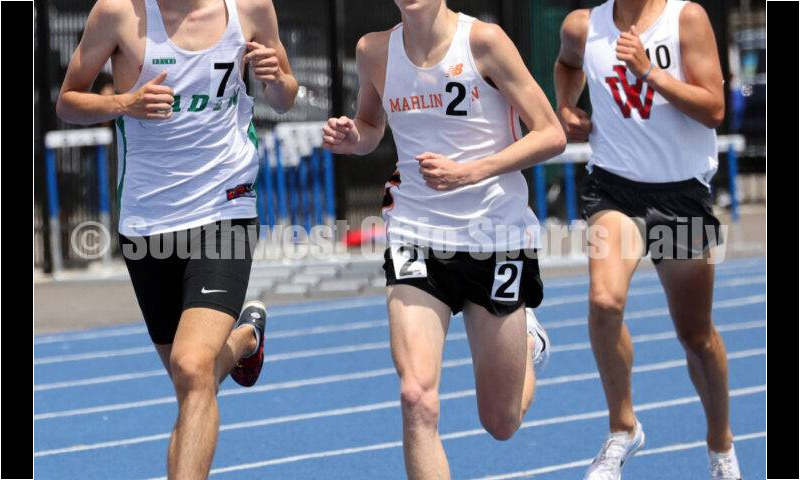 Badin High School's Nick Dunn (left) runs in front of Alliance Marlington's Colin Cernansky in the Division II boys 3,200-meter run June 1, 2024, during the state track & field meet at Welcome Stadium in Dayton. Dunn placed eighth. RICK CASSANO/STAFF