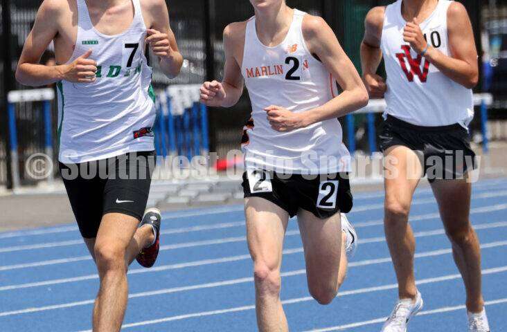 Badin High School's Nick Dunn (left) runs in front of Alliance Marlington's Colin Cernansky in the Division II boys 3,200-meter run June 1, 2024, during the state track & field meet at Welcome Stadium in Dayton. Dunn placed eighth. RICK CASSANO/STAFF