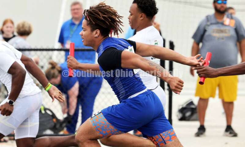 Hamilton High School's Javon McClain takes a handoff on the third leg of the Division I boys 400-meter relay June 1, 2024, during the state track & field meet at Welcome Stadium in Dayton. HHS placed second. RICK CASSANO/STAFF