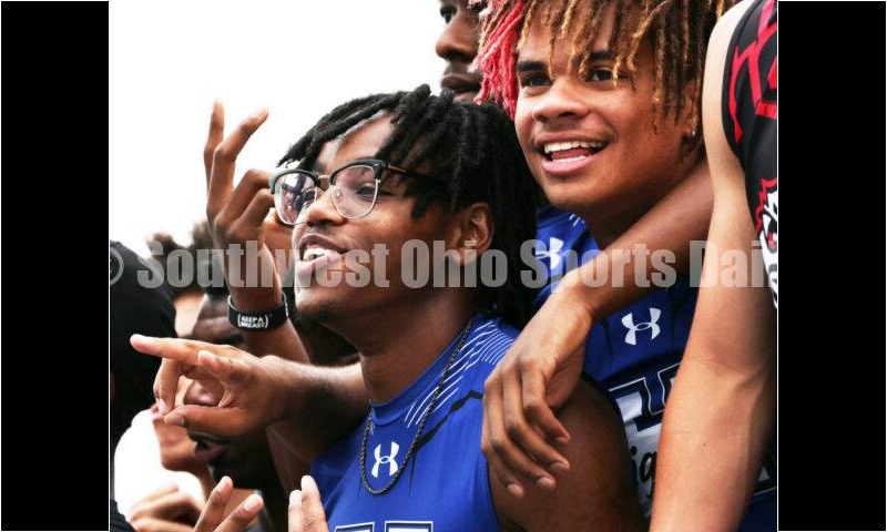 Hamilton High School's Landyn Pope (left) and Javon McClain celebrate on the podium after the Division I boys 400-meter relay June 1, 2024, during the state track & field meet at Welcome Stadium in Dayton. HHS placed second. RICK CASSANO/STAFF