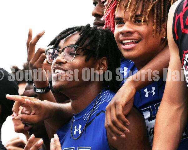 Hamilton High School's Landyn Pope (left) and Javon McClain celebrate on the podium after the Division I boys 400-meter relay June 1, 2024, during the state track & field meet at Welcome Stadium in Dayton. HHS placed second. RICK CASSANO/STAFF