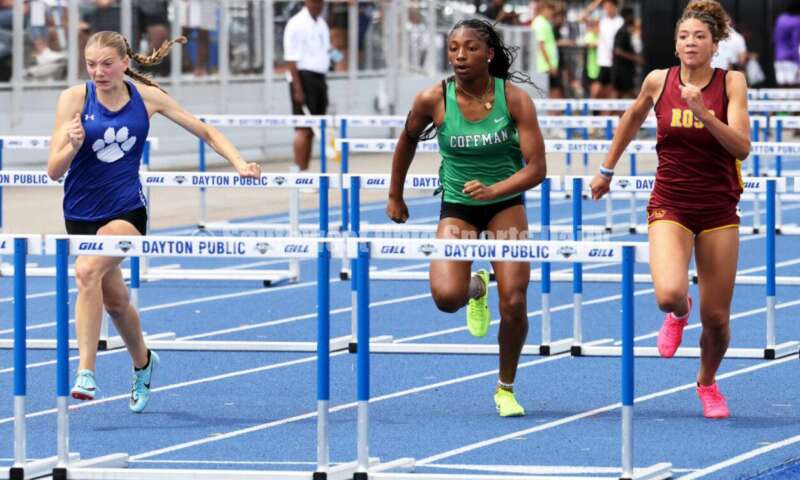 Ross High School's Myah Boze runs against Hilliard Davidson's Anna Wile (far left) and Dublin Coffman's Nadiya Webb in the Division I girls 100-meter hurdles June 1, 2024, during the state track & field meet at Welcome Stadium in Dayton. Boze placed seventh. RICK CASSANO/STAFF