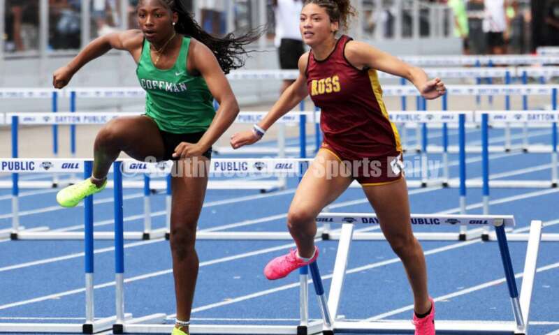 Ross High School's Myah Boze runs next to Dublin Coffman's Nadiya Webb in the Division I girls 100-meter hurdles June 1, 2024, during the state track & field meet at Welcome Stadium in Dayton. Boze placed seventh. RICK CASSANO/STAFF