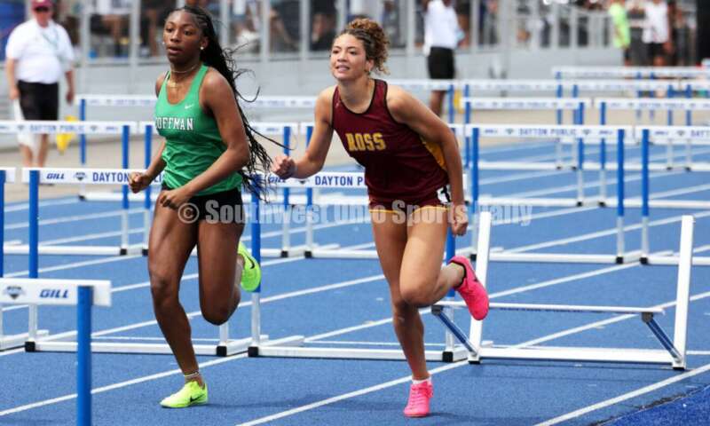 Ross High School's Myah Boze runs next to Dublin Coffman's Nadiya Webb in the Division I girls 100-meter hurdles June 1, 2024, during the state track & field meet at Welcome Stadium in Dayton. Boze placed seventh. RICK CASSANO/STAFF