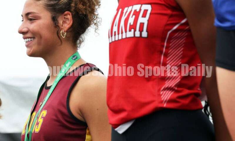 Ross High School's Myah Boze stands on the podium after placing seventh in the Division I girls 100-meter hurdles June 1, 2024, during the state track & field meet at Welcome Stadium in Dayton. RICK CASSANO/STAFF