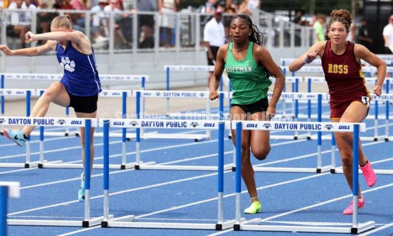Ross High School's Myah Boze runs against Hilliard Davidson's Anna Wile (far left) and Dublin Coffman's Nadiya Webb in the Division I girls 100-meter hurdles June 1, 2024, during the state track & field meet at Welcome Stadium in Dayton. Boze placed seventh. RICK CASSANO/STAFF