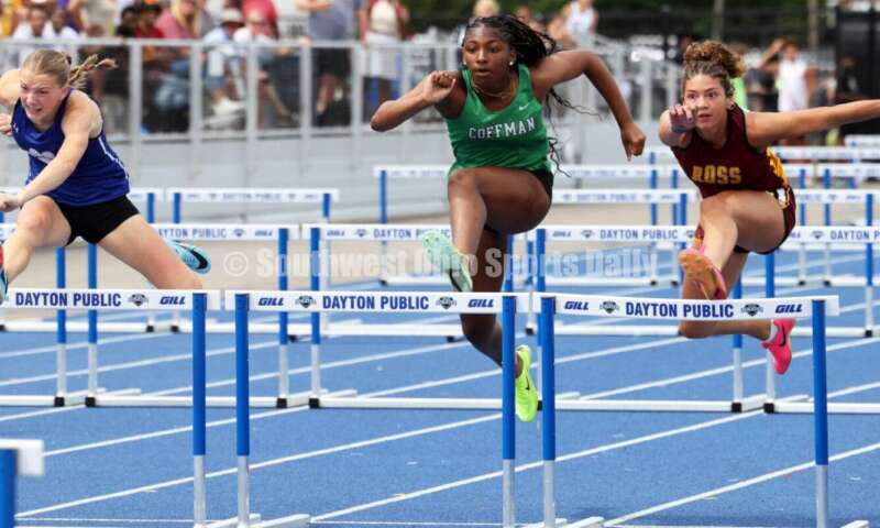 Ross High School's Myah Boze competes with Hilliard Davidson's Anna Wile (far left) and Dublin Coffman's Nadiya Webb in the Division I girls 100-meter hurdles June 1, 2024, during the state track & field meet at Welcome Stadium in Dayton. Boze placed seventh. RICK CASSANO/STAFF