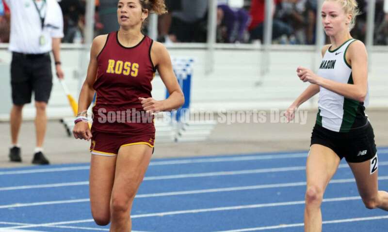 Ross High School's Myah Boze (left) runs ahead of Mason's Lily Eagleston in the Division I girls 300-meter hurdles June 1, 2024, during the state track & field meet at Welcome Stadium in Dayton. Boze placed third. RICK CASSANO/STAFF