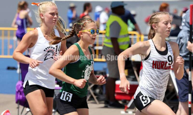 Waynesville High School's Samantha Erbach (left) trails Huron's Rylie Towns (right) and Athens' Sophia Szolosi in the Division II girls 3,200-meter run June 1, 2024, at the state track & field meet at Welcome Stadium in Dayton. Erbach placed fourth. RICK CASSANO/STAFF