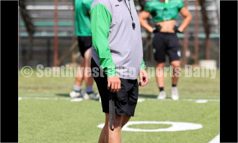 Harrison High School coach Derek Rehage watches the action Aug. 14, 2024, during a football practice at the school in Harrison. RICK CASSANO/STAFF