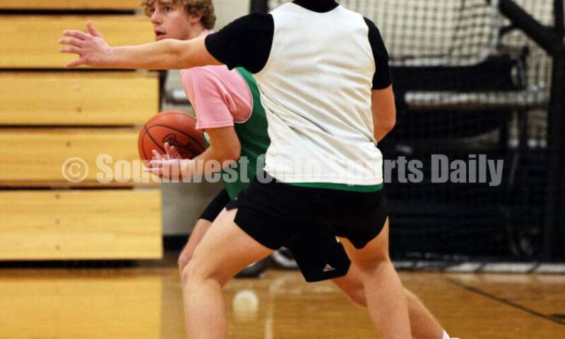Harrison High School's Michael Calderone looks for an open teammate Dec. 2, 2024, during a boys basketball practice session in Harrison. RICK CASSANO/STAFF