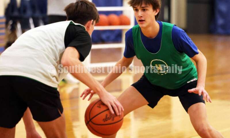 Harrison High School's Justin Marx works on defense Dec. 2, 2024, during a boys basketball practice session in Harrison. RICK CASSANO/STAFF