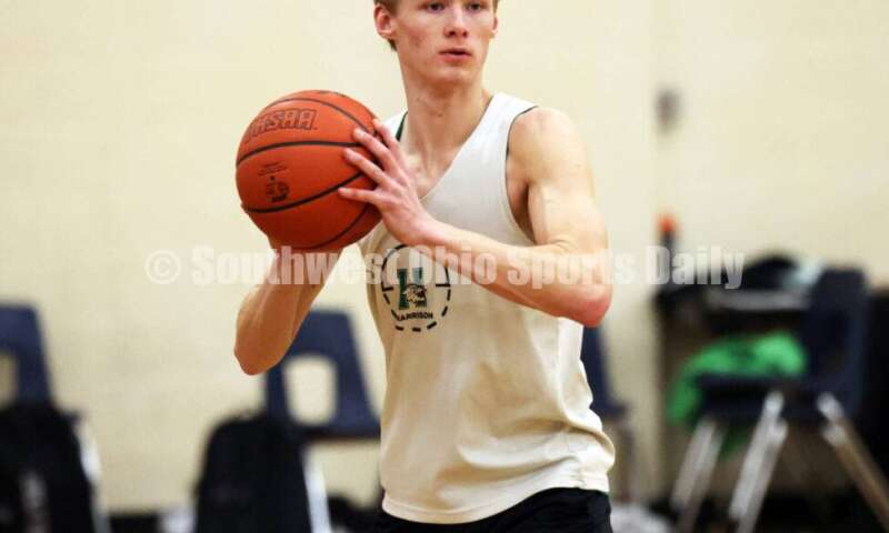 Harrison High School's Grant Meibers looks to make a pass Dec. 2, 2024, during a boys basketball practice session in Harrison. RICK CASSANO/STAFF