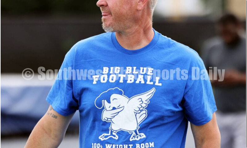 Hamilton High School assistant coach Jason Wolstenholm watches during youth football camp June 20, 2025, at Virgil Schwarm Stadium in Hamilton. RICK CASSANO/STAFF