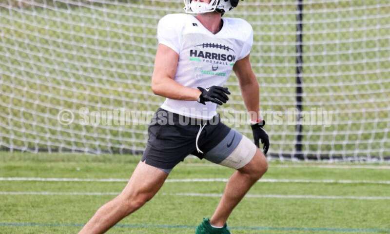 Harrison High School receiver Josh Adelsperger looks to make a catch Aug. 7, 2025, during a football practice at the school in Harrison. RICK CASSANO/STAFF