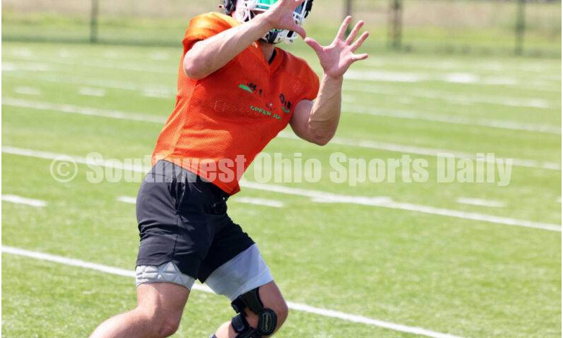 Harrison High School's Preston Flick prepares to make a catch Aug. 7, 2025, during a football practice at the school in Harrison. RICK CASSANO/STAFF