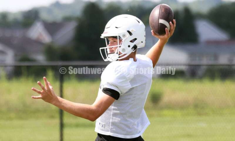 Harrison High School quarterback Brady Lawhon throws a pass Aug. 7, 2025, during a football practice at the school in Harrison. RICK CASSANO/STAFF