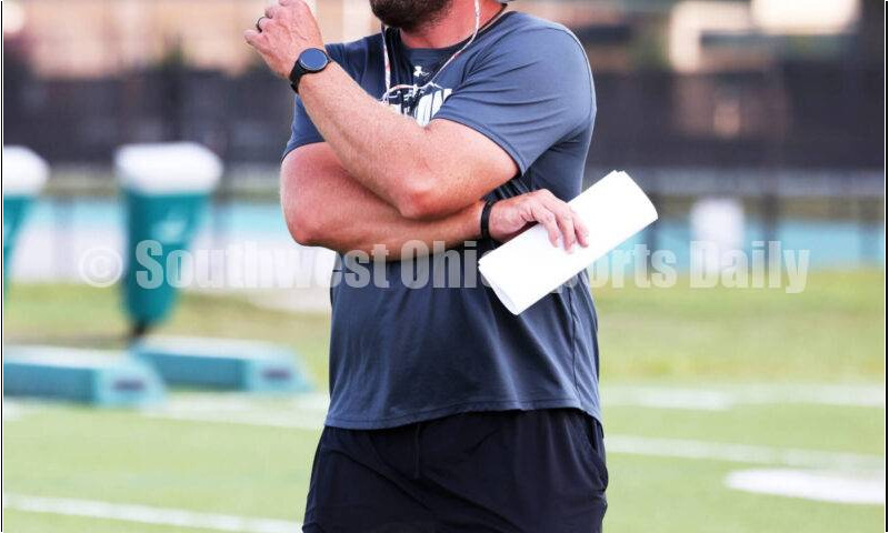 Harrison High School coach Derek Rehage watches the action Aug. 7, 2025, during a football practice at the school in Harrison. RICK CASSANO/STAFF