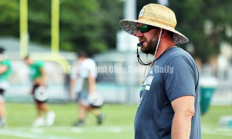 Harrison High School coach Derek Rehage watches the action Aug. 7, 2025, during a football practice at the school in Harrison. RICK CASSANO/STAFF