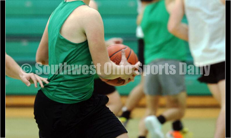 Harrison High School's Brady Lawhon drives to the basket Nov. 25, 2025, during a boys basketball practice in Harrison. RICK CASSANO/STAFF