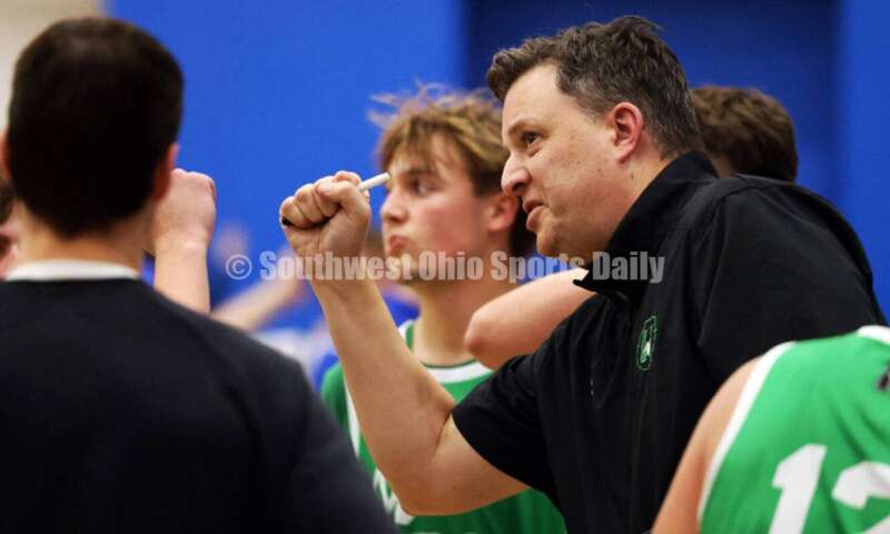 Harrison High School coach Andy Marx reacts in a huddle Dec. 8, 2025, during a boys basketball game at Reading. Harrison won 62-42. RICK CASSANO/STAFF