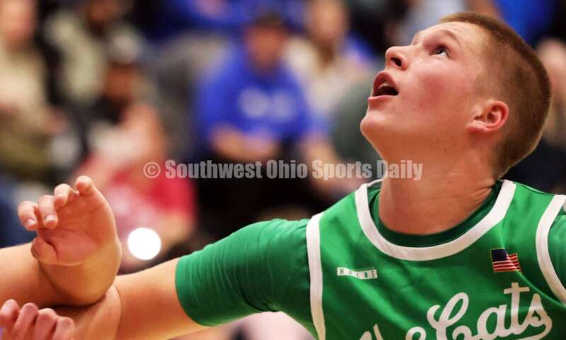 Harrison High School's Brady Lawhon eyes a rebound Dec. 8, 2025, during a boys basketball game at Reading. Harrison won 62-42. RICK CASSANO/STAFF