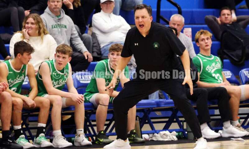 Harrison High School coach Andy Marx reacts on the sideline Dec. 8, 2025, during a boys basketball game at Reading. Harrison won 62-42. RICK CASSANO/STAFF