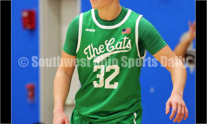 Harrison High School's Brady Lawhon sets up defensively Dec. 8, 2025, during a boys basketball game at Reading. Harrison won 62-42. RICK CASSANO/STAFF